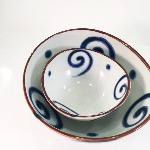 COUPELLE PORCELAINE À VOLUTES BLEUES